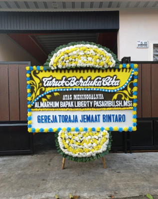 Papan Bunga Duka di Moti